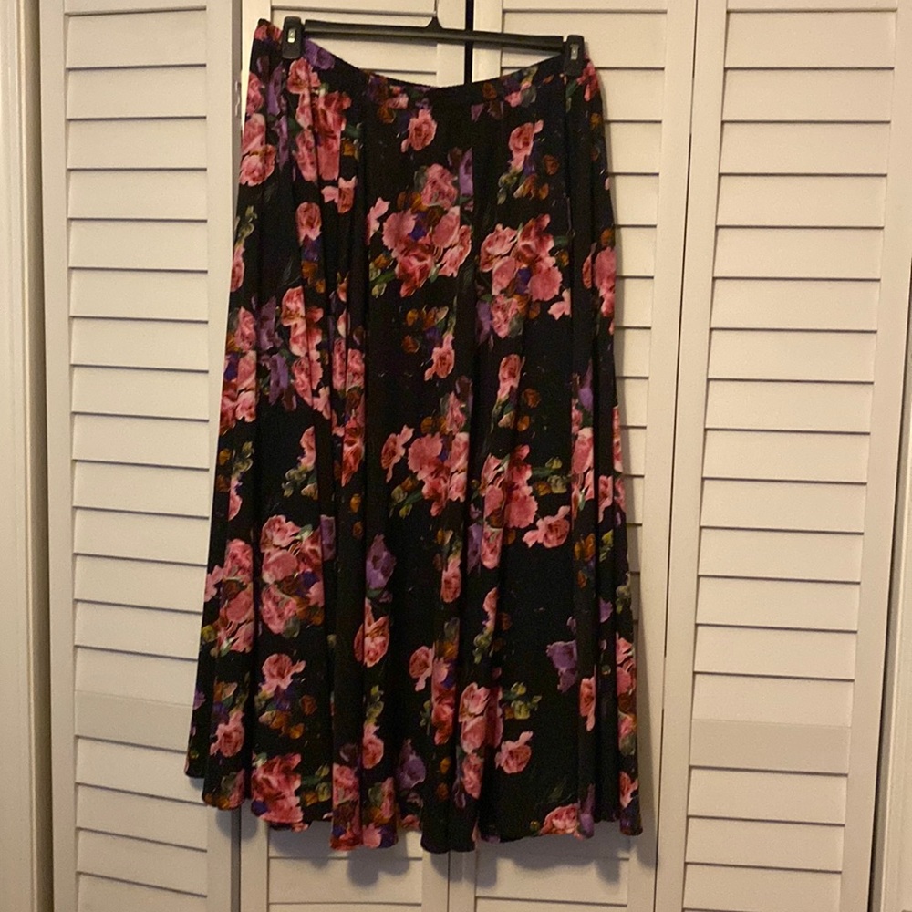 Beautiful skirt black background with rose flowers